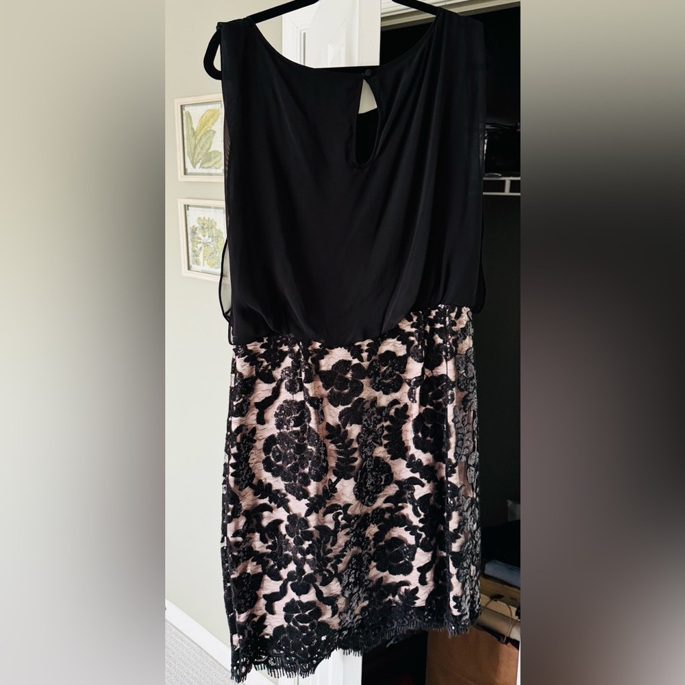Calvin Klein knee length cocktail dress. Black sequins on bottom,Nude underlay